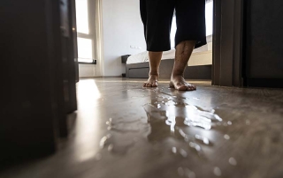 Senior woman is stepping on the wet floor how to prevent and care of the elderly safe