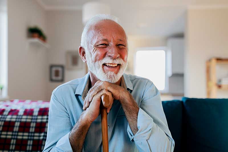 Senior man at home with Questions to Ask a Home Health Agency