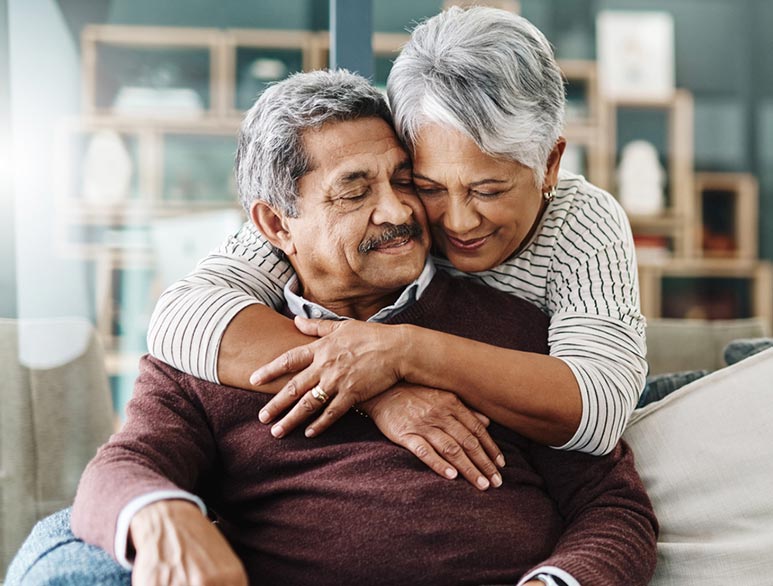 couple embracing after receiving in-home care and cdpap