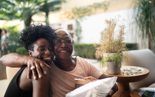 Granddaughter caring for grandmother at home with CDPAP