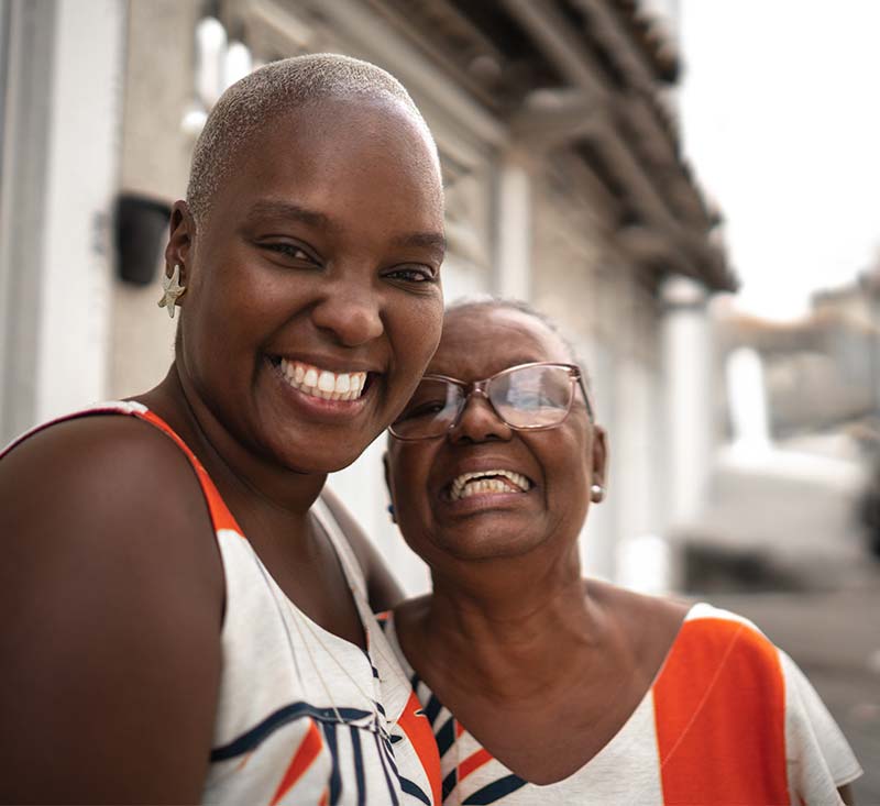 Mother and daughter embracing