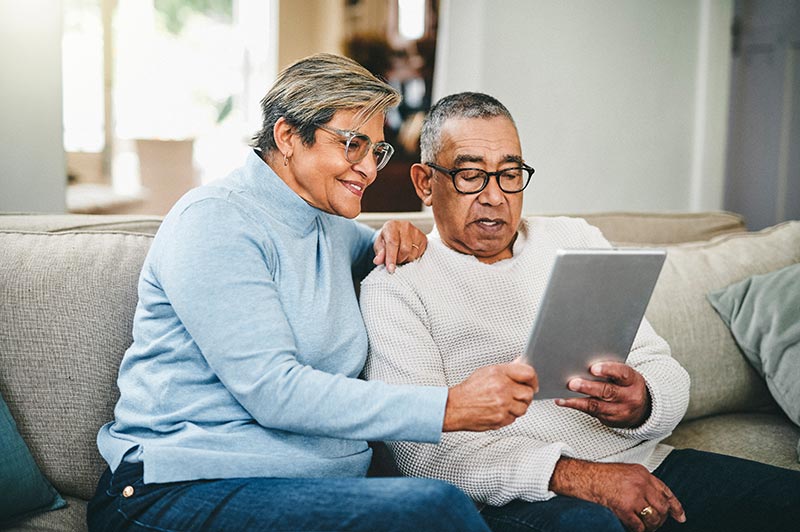 Seniors using technology together